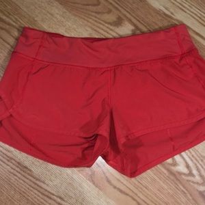 Orange lululemon shorts